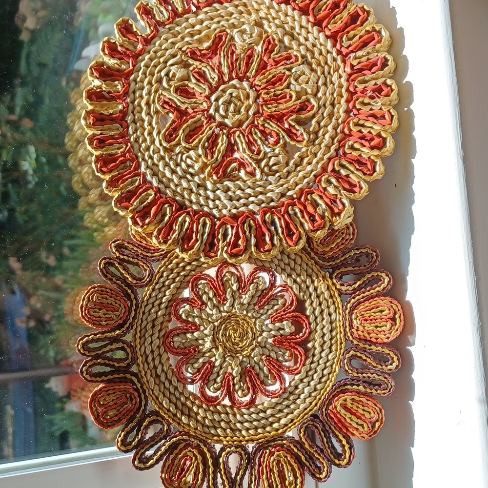 Pair of woven raffia trivets